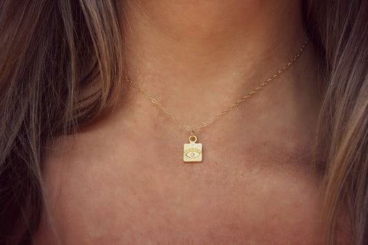 Gold evil eye talisman necklace