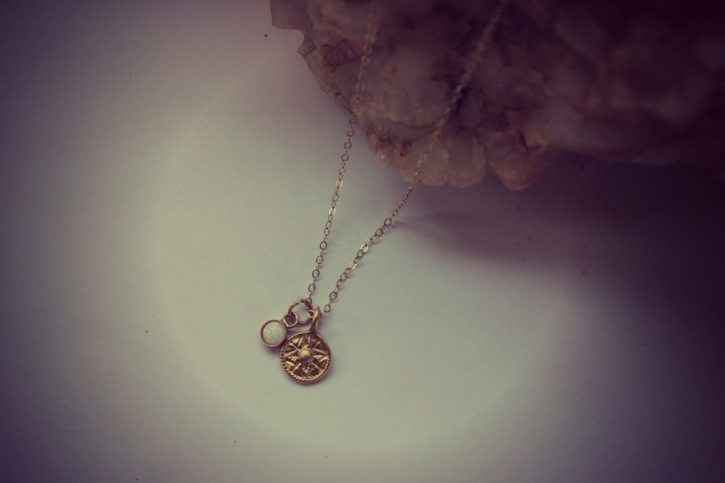 Gold coin necklace with opal charm