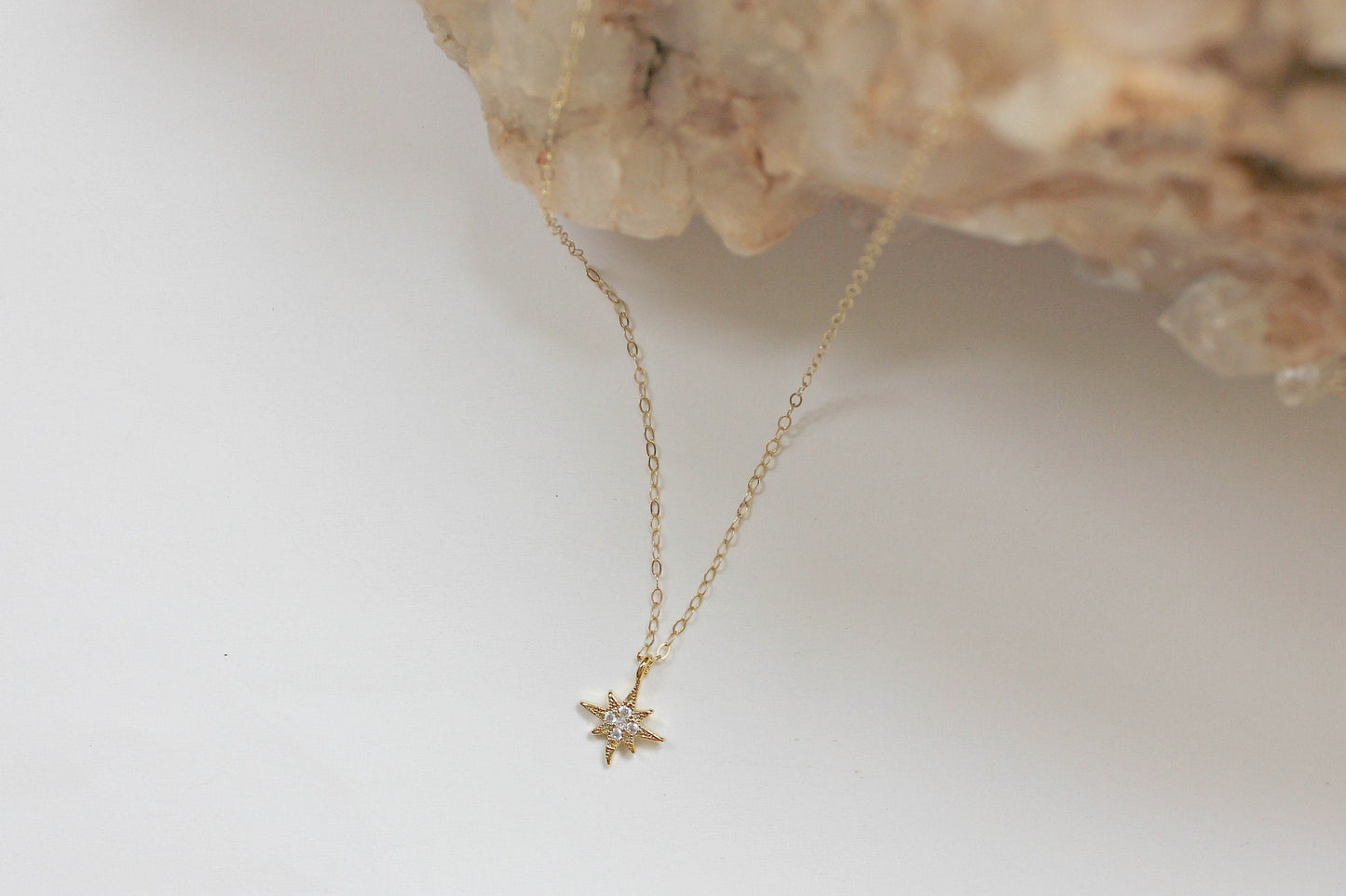 CZ starburst necklace, cz north star pendant, small gold necklace, layering necklace