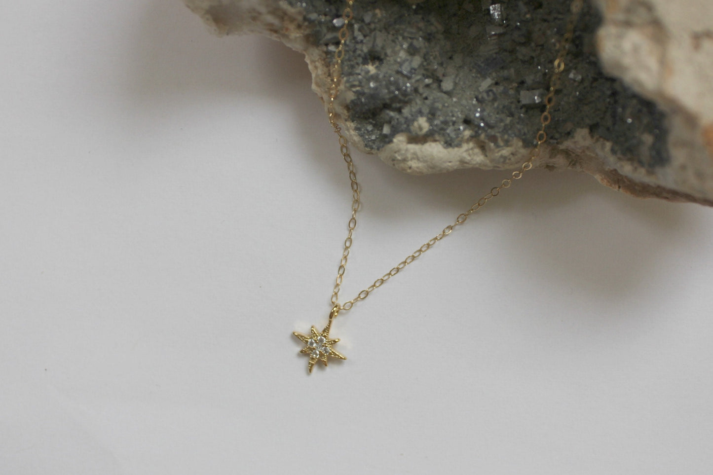 CZ starburst necklace, cz north star pendant, small gold necklace, layering necklace