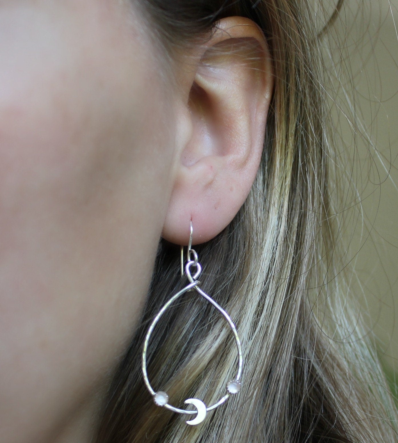 Silver crescent moon hoop earrings with moonstone