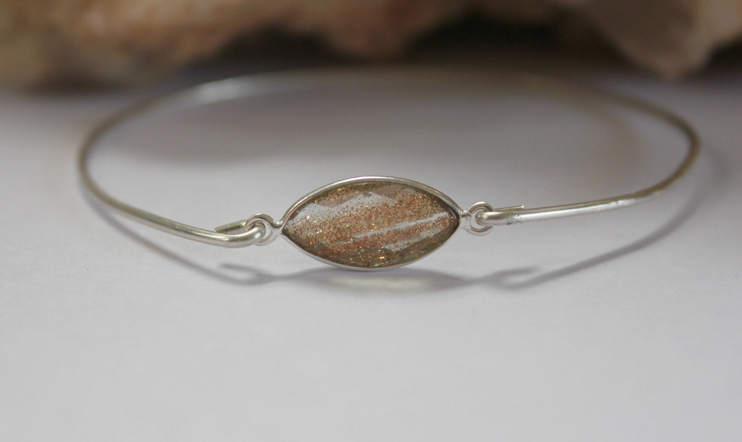Sterling silver bracelet with copper flecks, silver  bangle, copper infused gemstone and sterling silver