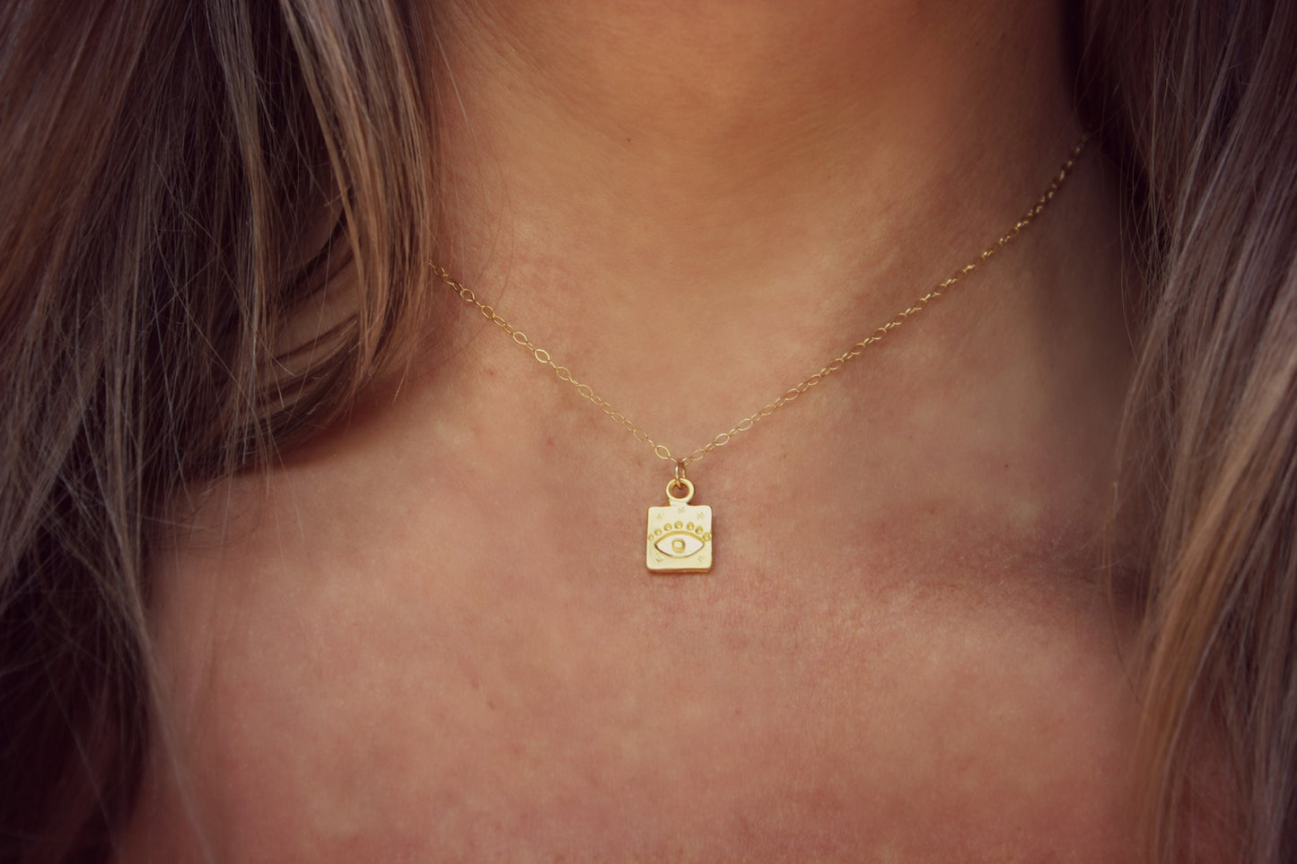 Gold evil eye talisman necklace