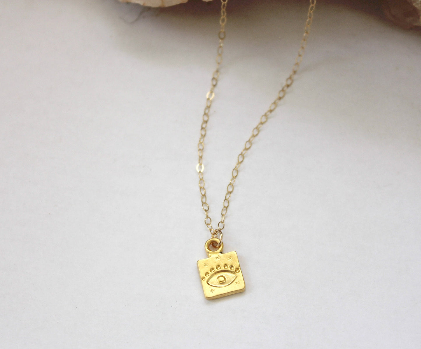 Gold evil eye talisman necklace